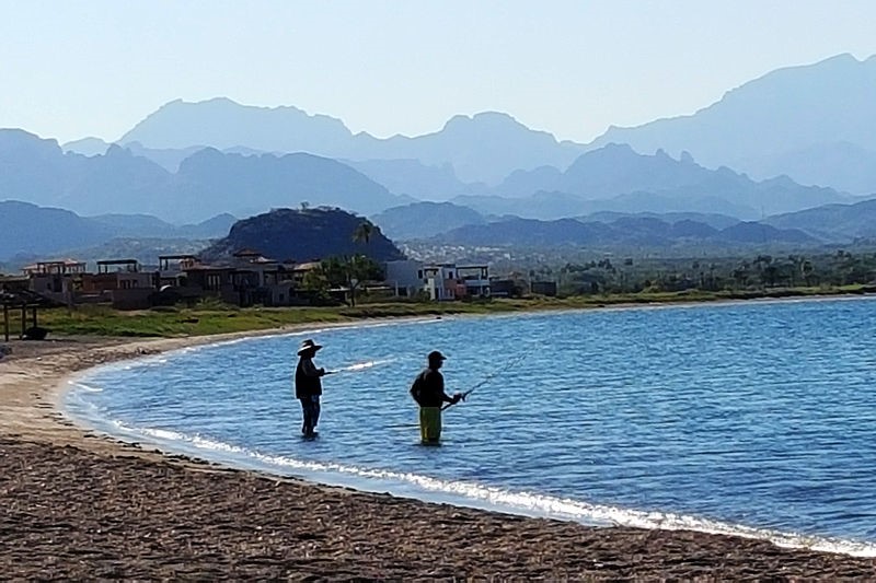 Do a little fishing on the Loreto Bay beach as the Sierra de la Giganta mountains loom in the background.