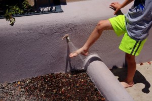 After a trip to the beach, a faucet on upstairs deck can be used to rinse feet and more.
