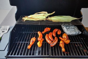 A gas grill with four internal burners and a side burner was added in the summer of 2014 so you can grill your favorite meats and/or vegetables!