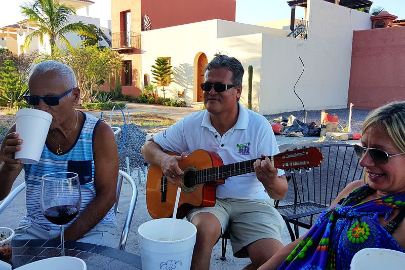 Pedro hosts a "Fat Tuesday" happy hour outside his deli in Agua Viva and might even entertain.